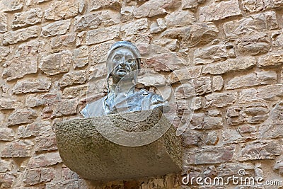 Bust sculpture of Dante Alighieriâ€™s head shoulders chest on br Editorial Stock Photo